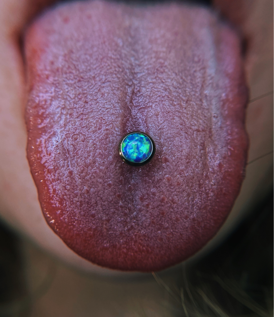 Прокол языка