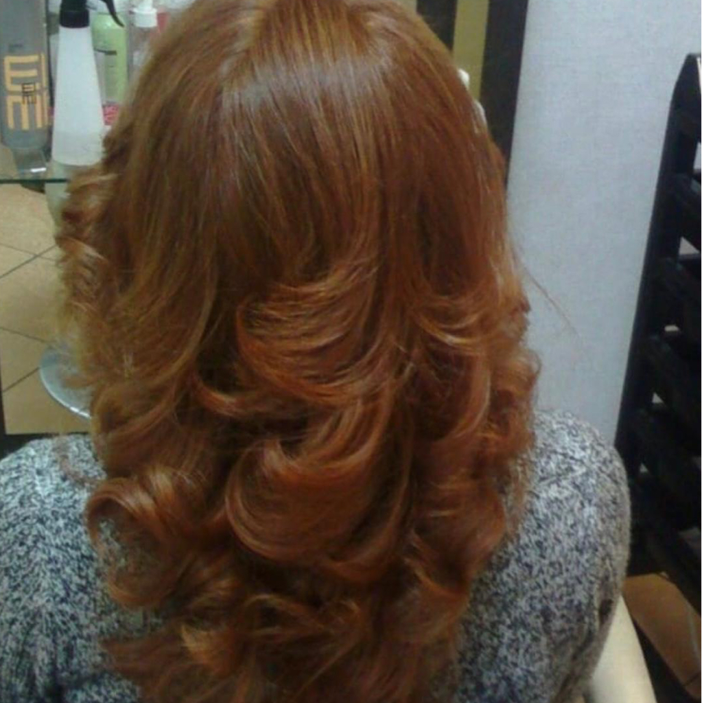 Женская стрижка на длинные волосы