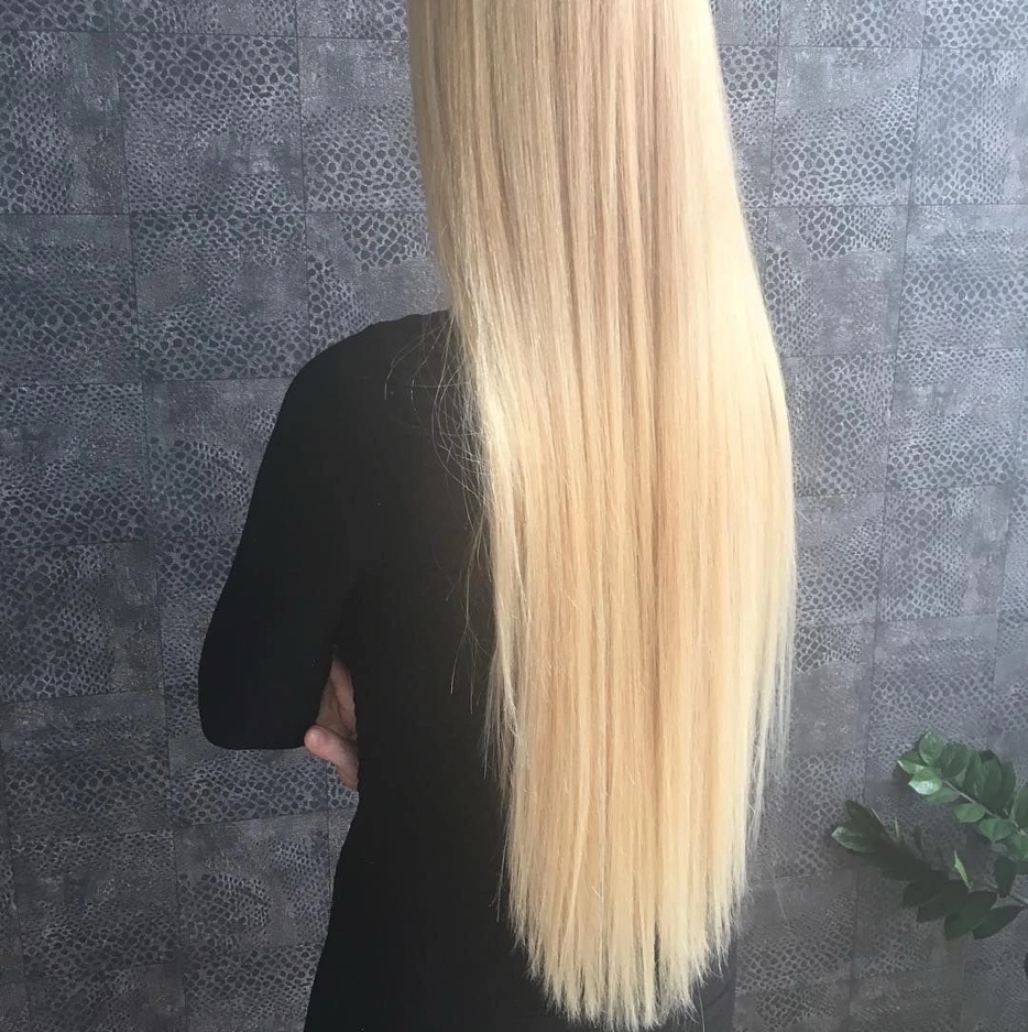 Стрижка длинные волосы( длина от 25 см,включает мытье головы и легкую укладку)