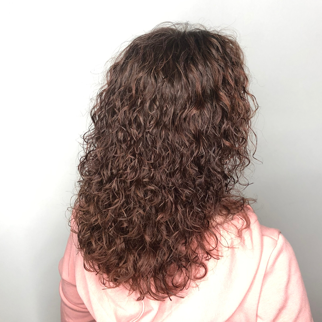 Биозавивка , химическая завивка на длинные волосы.