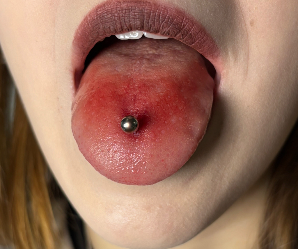 Прокол языка