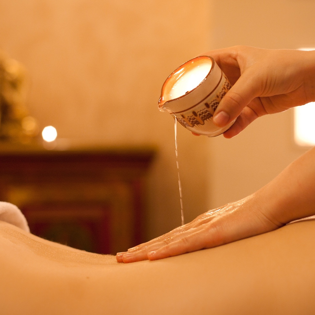 Массаж горячим воском