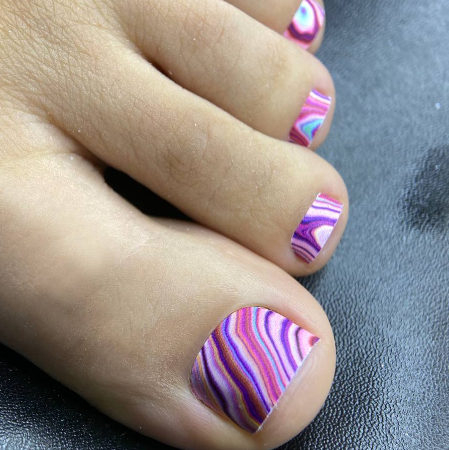 Pedicure toes + gel polish coating + design