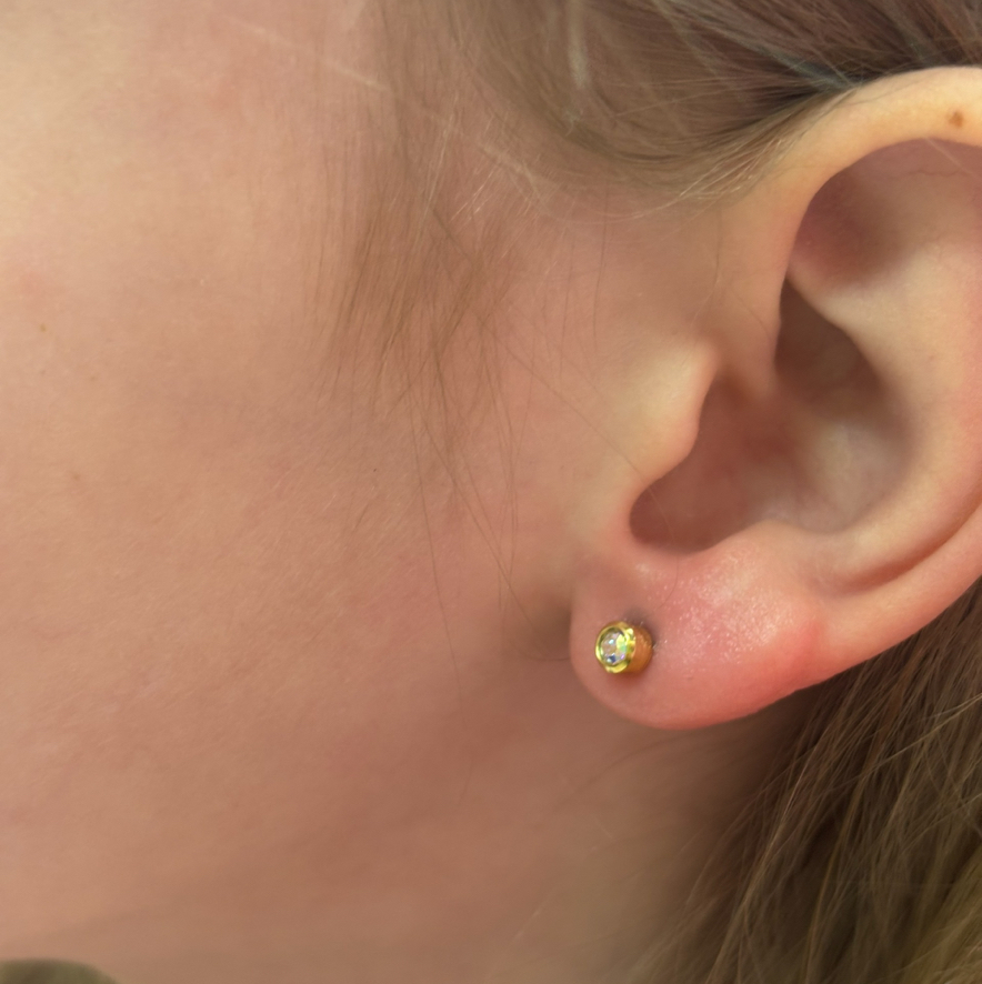 Пирсинг мочки уха