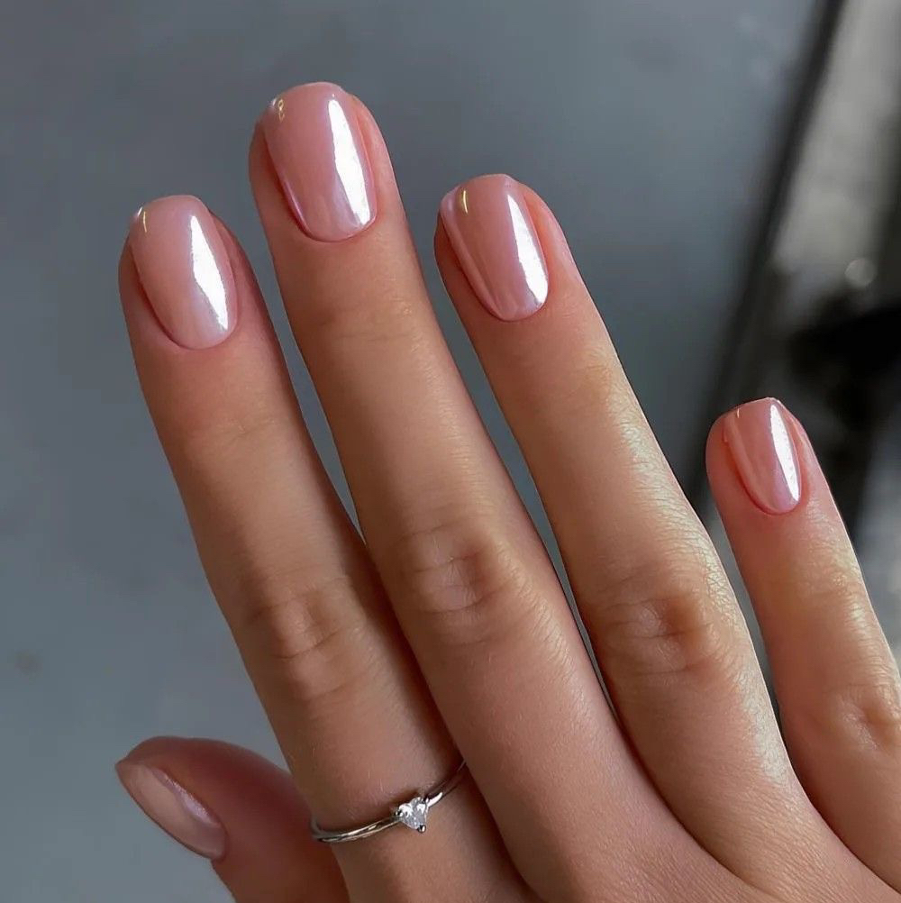 Manicure with gel overlay and chrome design