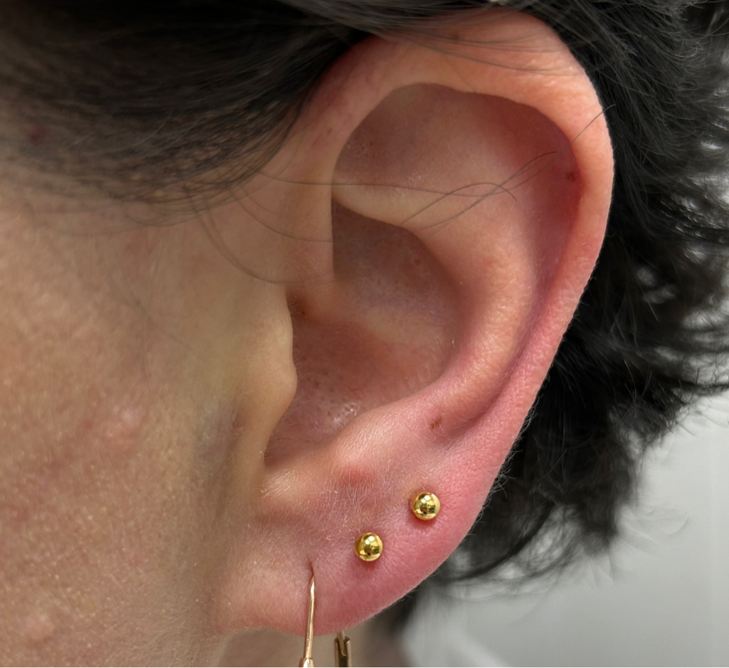 Пирсинг мочки уха