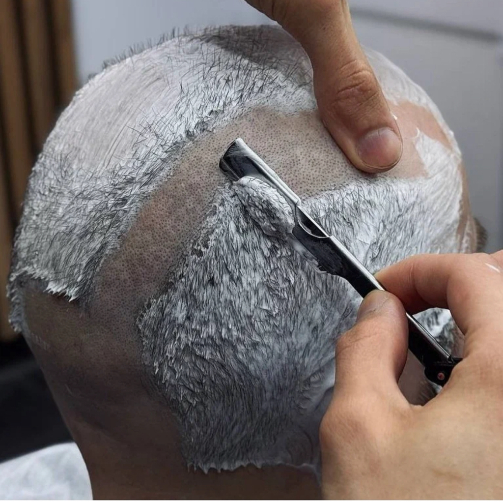 Бритье головы шаветкой (лезвием)