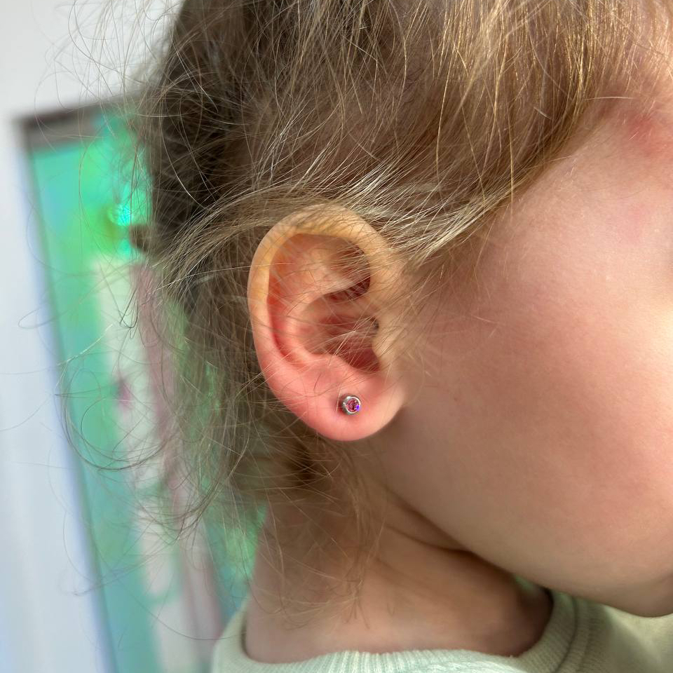 Пирсинг мочки уха