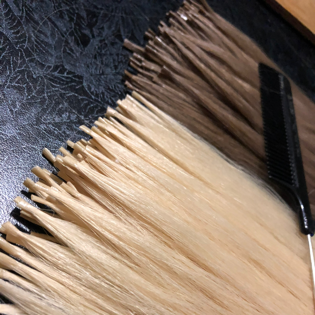 Капсулирование нарощенных волос