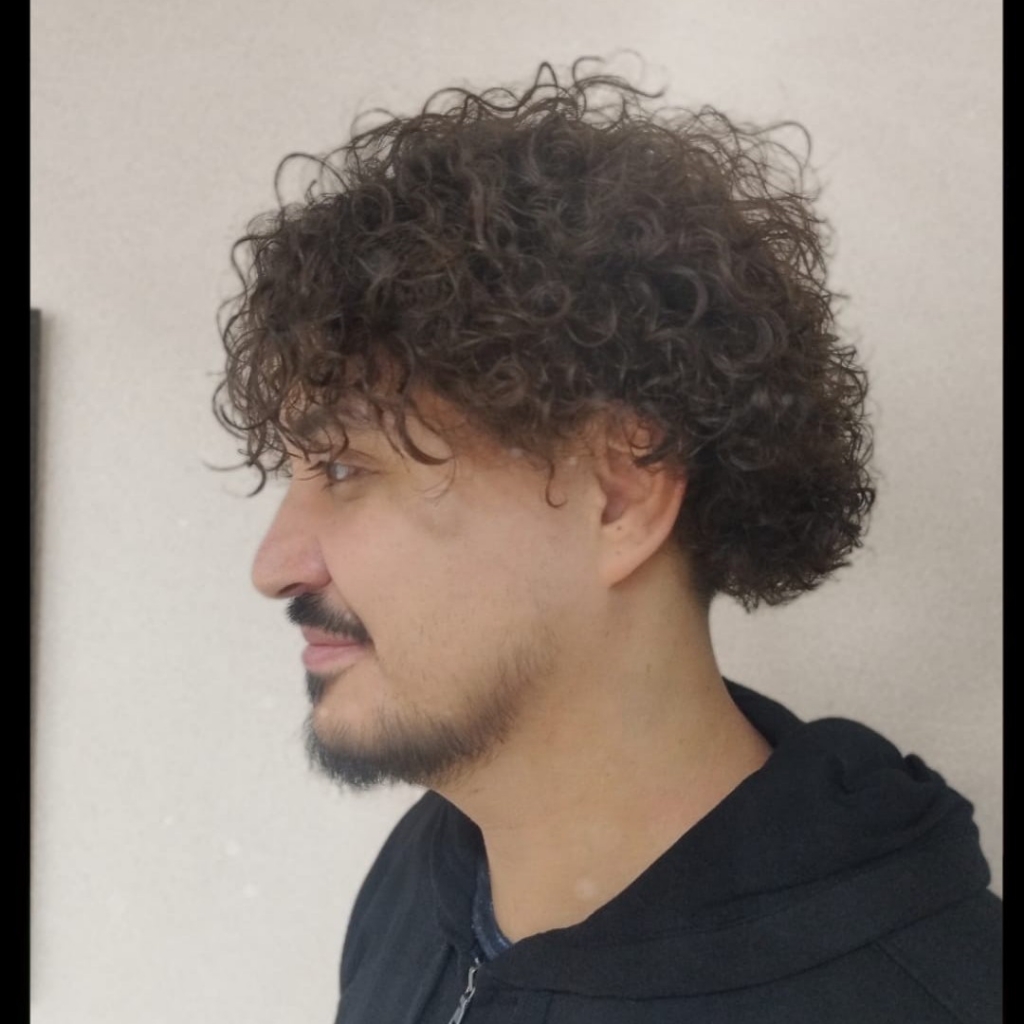 Herrenschnitt mit Dauerwelle